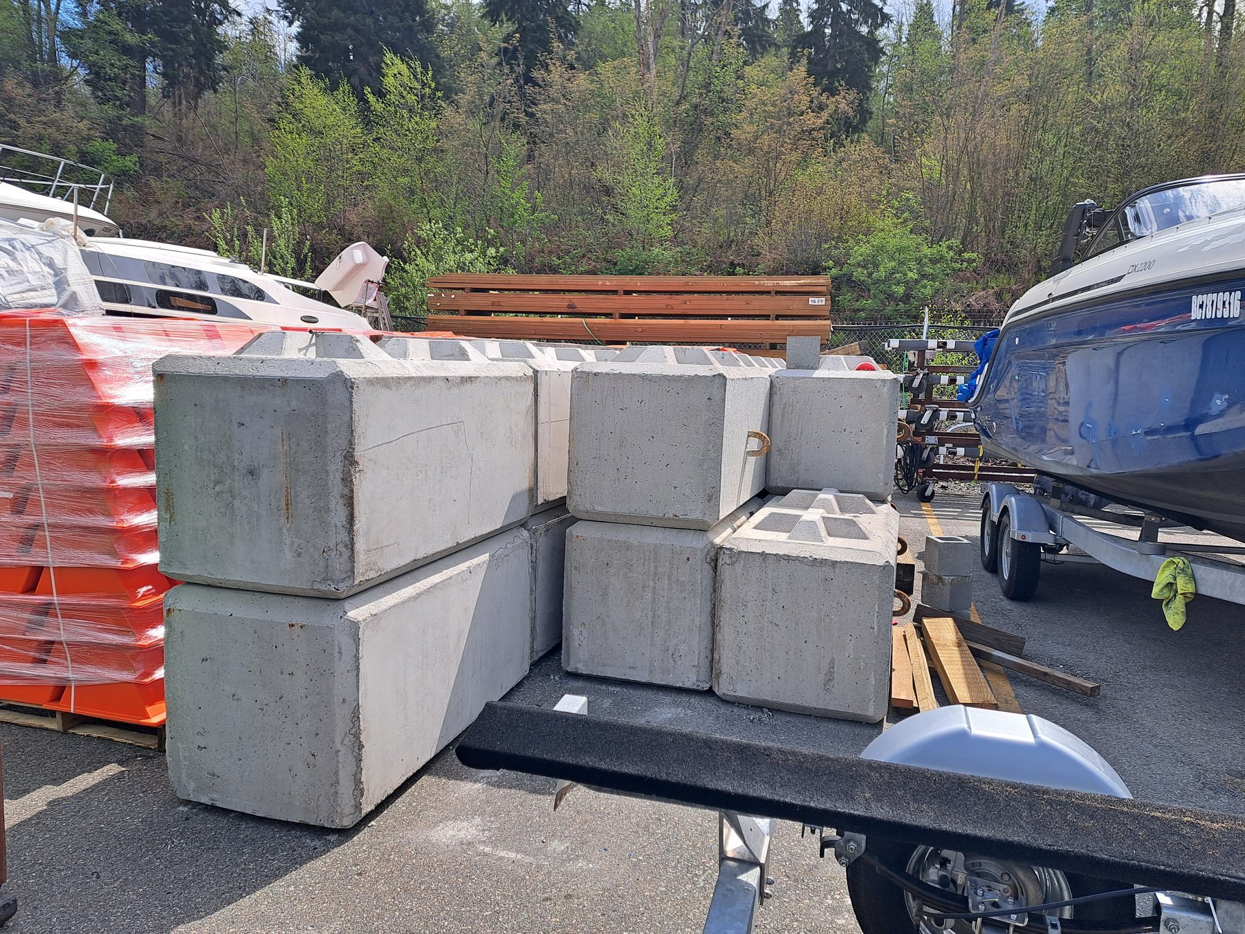 Refurbished concrete anchor blocks staged for redeployment