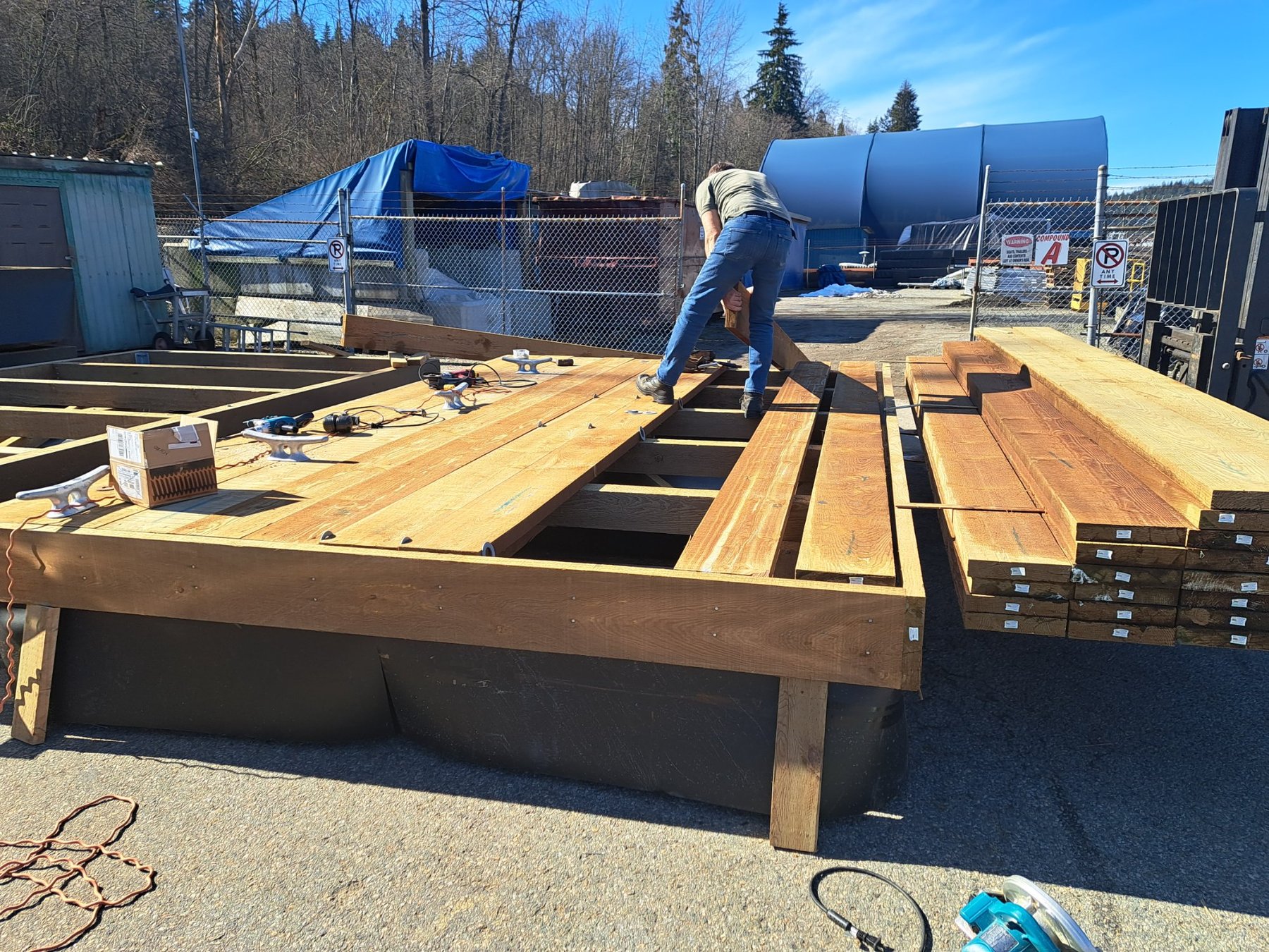 Fastening timber decking to floating dock substructure