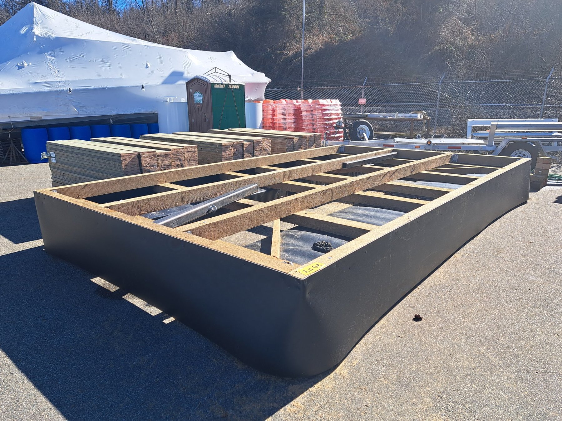 Twenty-foot HDPE pontoon with cross-framing ready for decking